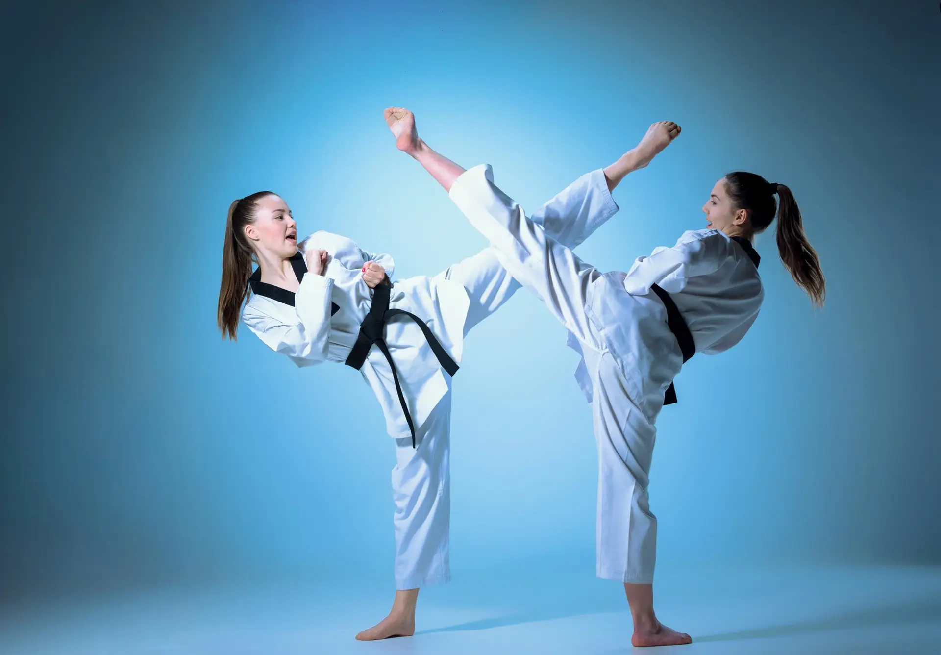 The studio shot of group of kids training karate martial arts